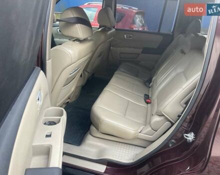 Червоний Хонда Пілот, об'ємом двигуна 3.47 л та пробігом 350 тис. км за 11500 $, фото 27 на Automoto.ua