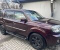 Червоний Хонда Пілот, об'ємом двигуна 3.5 л та пробігом 350 тис. км за 11500 $, фото 1 на Automoto.ua