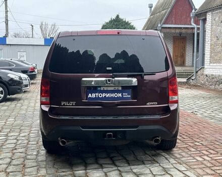 Красный Хонда Пилот, объемом двигателя 3.5 л и пробегом 152 тыс. км за 13999 $, фото 4 на Automoto.ua