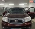 Красный Хонда Пилот, объемом двигателя 3.47 л и пробегом 125 тыс. км за 15500 $, фото 1 на Automoto.ua