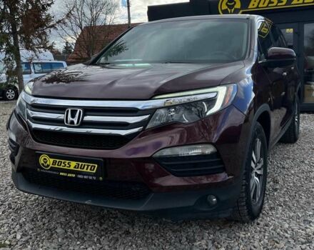 Красный Хонда Пилот, объемом двигателя 3.5 л и пробегом 246 тыс. км за 17300 $, фото 2 на Automoto.ua