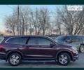 Красный Хонда Пилот, объемом двигателя 0 л и пробегом 180 тыс. км за 23400 $, фото 1 на Automoto.ua