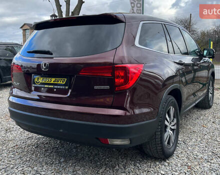 Красный Хонда Пилот, объемом двигателя 3.47 л и пробегом 246 тыс. км за 17300 $, фото 6 на Automoto.ua