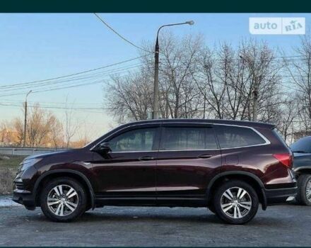 Красный Хонда Пилот, объемом двигателя 0 л и пробегом 180 тыс. км за 23400 $, фото 4 на Automoto.ua