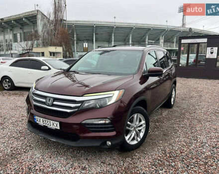 Красный Хонда Пилот, объемом двигателя 3.47 л и пробегом 179 тыс. км за 19999 $, фото 2 на Automoto.ua