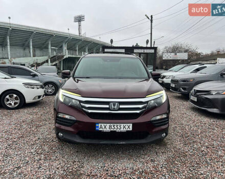 Красный Хонда Пилот, объемом двигателя 3.47 л и пробегом 179 тыс. км за 19999 $, фото 1 на Automoto.ua