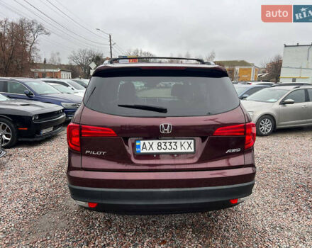 Красный Хонда Пилот, объемом двигателя 3.47 л и пробегом 179 тыс. км за 19999 $, фото 5 на Automoto.ua