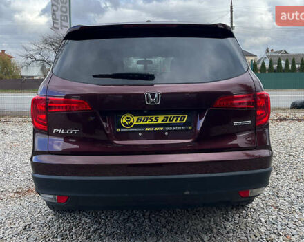 Красный Хонда Пилот, объемом двигателя 3.47 л и пробегом 246 тыс. км за 17300 $, фото 5 на Automoto.ua