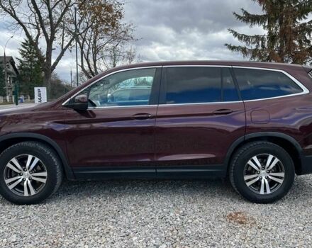 Красный Хонда Пилот, объемом двигателя 3.5 л и пробегом 246 тыс. км за 17300 $, фото 3 на Automoto.ua