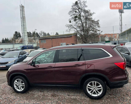 Красный Хонда Пилот, объемом двигателя 3.47 л и пробегом 179 тыс. км за 19999 $, фото 3 на Automoto.ua