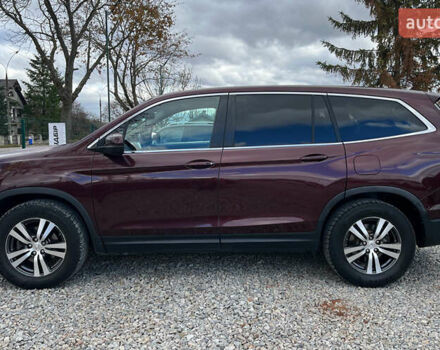 Красный Хонда Пилот, объемом двигателя 3.47 л и пробегом 246 тыс. км за 17300 $, фото 3 на Automoto.ua