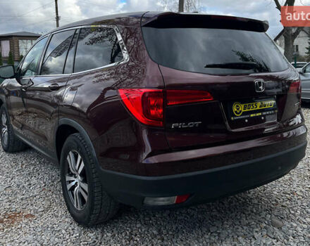 Красный Хонда Пилот, объемом двигателя 3.47 л и пробегом 246 тыс. км за 17300 $, фото 4 на Automoto.ua