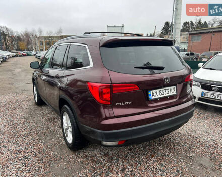 Красный Хонда Пилот, объемом двигателя 3.47 л и пробегом 179 тыс. км за 19999 $, фото 4 на Automoto.ua