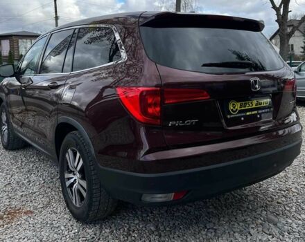 Красный Хонда Пилот, объемом двигателя 3.5 л и пробегом 246 тыс. км за 17300 $, фото 4 на Automoto.ua