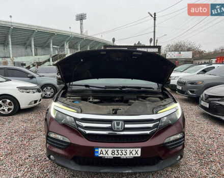 Красный Хонда Пилот, объемом двигателя 3.47 л и пробегом 179 тыс. км за 19999 $, фото 11 на Automoto.ua