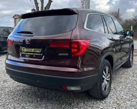 Красный Хонда Пилот, объемом двигателя 3.5 л и пробегом 246 тыс. км за 17300 $, фото 6 на Automoto.ua