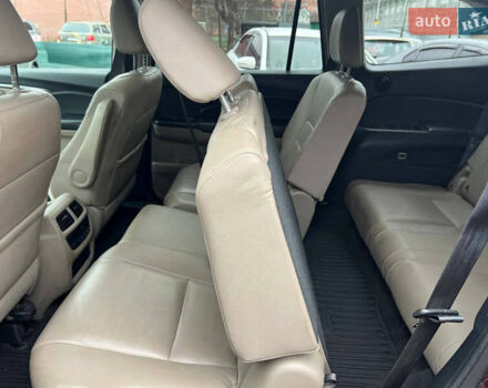 Красный Хонда Пилот, объемом двигателя 3.47 л и пробегом 179 тыс. км за 19999 $, фото 13 на Automoto.ua