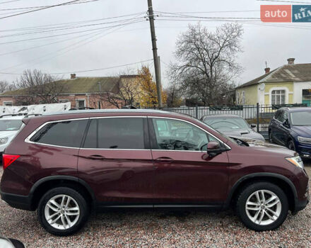 Красный Хонда Пилот, объемом двигателя 3.47 л и пробегом 179 тыс. км за 19999 $, фото 6 на Automoto.ua