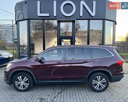 Красный Хонда Пилот, объемом двигателя 3.47 л и пробегом 138 тыс. км за 18899 $, фото 4 на Automoto.ua