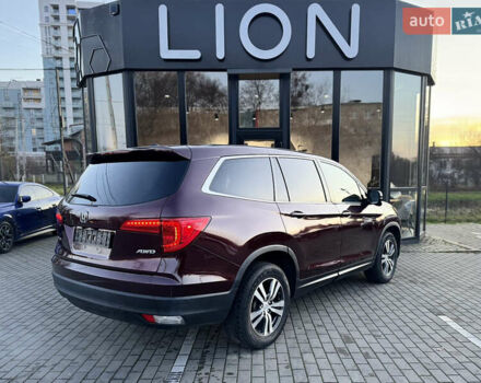 Красный Хонда Пилот, объемом двигателя 3.47 л и пробегом 138 тыс. км за 18899 $, фото 6 на Automoto.ua