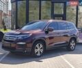 Красный Хонда Пилот, объемом двигателя 3.47 л и пробегом 138 тыс. км за 16700 $, фото 1 на Automoto.ua
