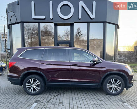 Красный Хонда Пилот, объемом двигателя 3.47 л и пробегом 138 тыс. км за 18899 $, фото 3 на Automoto.ua