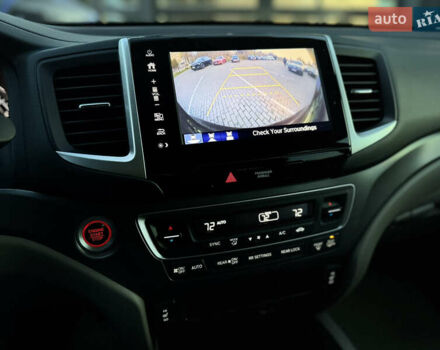 Красный Хонда Пилот, объемом двигателя 3.47 л и пробегом 138 тыс. км за 18899 $, фото 12 на Automoto.ua