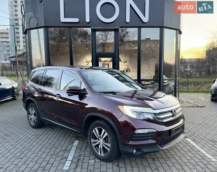 Красный Хонда Пилот, объемом двигателя 3.47 л и пробегом 138 тыс. км за 18899 $, фото 1 на Automoto.ua