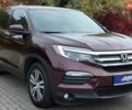 Червоний Хонда Пілот, об'ємом двигуна 3.47 л та пробігом 138 тис. км за 14800 $, фото 1 на Automoto.ua