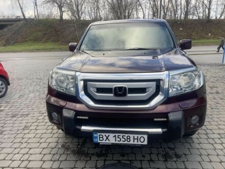 Красный Хонда Пилот, объемом двигателя 3.5 л и пробегом 350 тыс. км за 11500 $, фото 1 на Automoto.ua