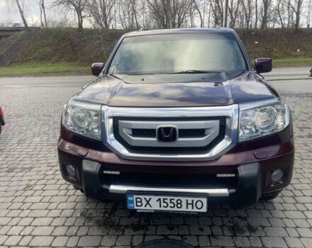 Красный Хонда Пилот, объемом двигателя 3.5 л и пробегом 350 тыс. км за 11500 $, фото 1 на Automoto.ua