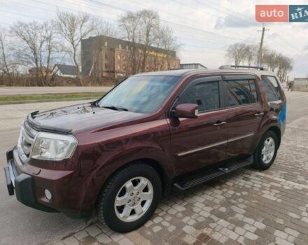 Красный Хонда Пилот, объемом двигателя 3.47 л и пробегом 255 тыс. км за 8900 $, фото 1 на Automoto.ua