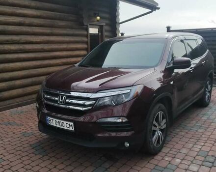 Красный Хонда Пилот, объемом двигателя 3.5 л и пробегом 170 тыс. км за 22000 $, фото 1 на Automoto.ua
