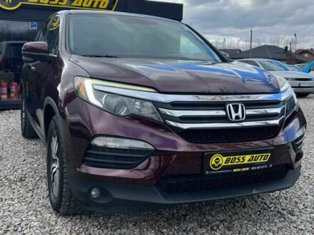 Красный Хонда Пилот, объемом двигателя 3.5 л и пробегом 246 тыс. км за 17300 $, фото 1 на Automoto.ua