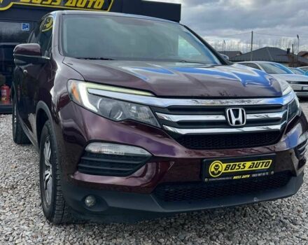 Красный Хонда Пилот, объемом двигателя 3.5 л и пробегом 246 тыс. км за 17300 $, фото 1 на Automoto.ua