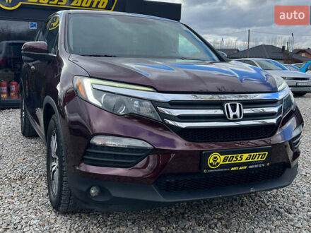 Красный Хонда Пилот, объемом двигателя 3.47 л и пробегом 246 тыс. км за 17300 $, фото 1 на Automoto.ua