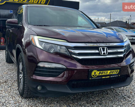 Красный Хонда Пилот, объемом двигателя 3.47 л и пробегом 246 тыс. км за 17300 $, фото 1 на Automoto.ua