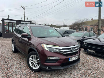 Красный Хонда Пилот, объемом двигателя 3.47 л и пробегом 179 тыс. км за 19999 $, фото 1 на Automoto.ua