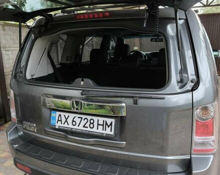 Сірий Хонда Пілот, об'ємом двигуна 3.5 л та пробігом 141 тис. км за 13200 $, фото 6 на Automoto.ua