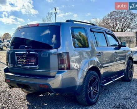 Сірий Хонда Пілот, об'ємом двигуна 3.5 л та пробігом 250 тис. км за 11800 $, фото 4 на Automoto.ua