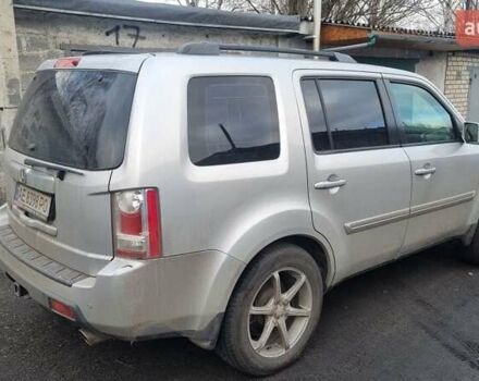 Серый Хонда Пилот, объемом двигателя 3.5 л и пробегом 250 тыс. км за 12000 $, фото 5 на Automoto.ua