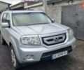 Серый Хонда Пилот, объемом двигателя 3.5 л и пробегом 250 тыс. км за 12000 $, фото 1 на Automoto.ua