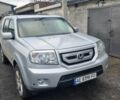Серый Хонда Пилот, объемом двигателя 3.5 л и пробегом 250 тыс. км за 12000 $, фото 1 на Automoto.ua