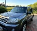 Сірий Хонда Пілот, об'ємом двигуна 3.5 л та пробігом 346 тис. км за 9999 $, фото 1 на Automoto.ua