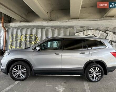 Серый Хонда Пилот, объемом двигателя 3 л и пробегом 125 тыс. км за 23000 $, фото 3 на Automoto.ua