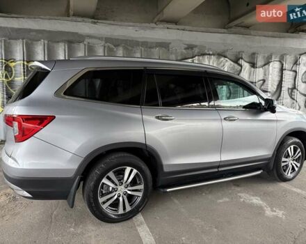 Серый Хонда Пилот, объемом двигателя 3 л и пробегом 125 тыс. км за 23000 $, фото 9 на Automoto.ua