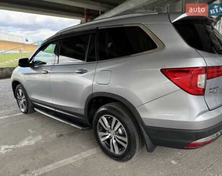 Серый Хонда Пилот, объемом двигателя 3 л и пробегом 125 тыс. км за 23000 $, фото 6 на Automoto.ua