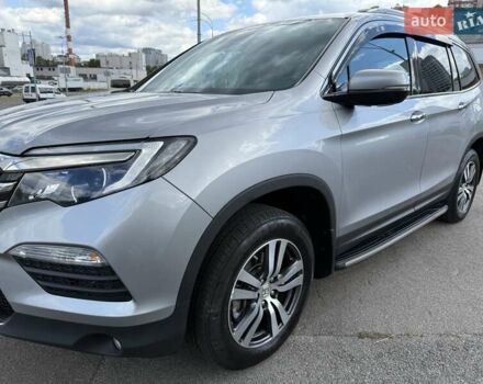 Серый Хонда Пилот, объемом двигателя 3 л и пробегом 125 тыс. км за 23500 $, фото 3 на Automoto.ua