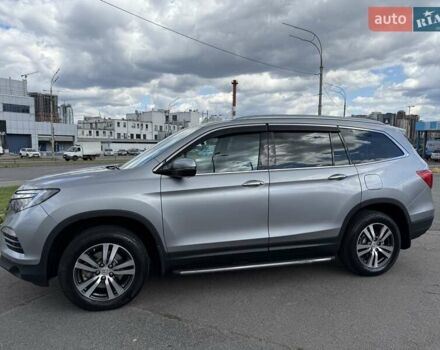 Серый Хонда Пилот, объемом двигателя 3 л и пробегом 125 тыс. км за 23500 $, фото 5 на Automoto.ua