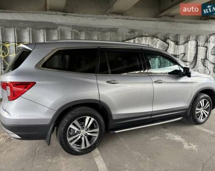 Серый Хонда Пилот, объемом двигателя 3 л и пробегом 125 тыс. км за 23000 $, фото 12 на Automoto.ua